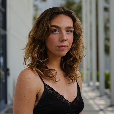 a woman posing for headshot